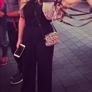 One piece, pant outfit, size medium in black